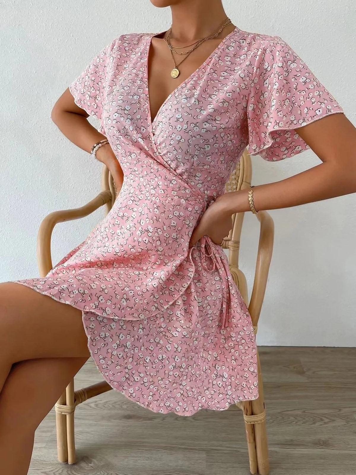 Floral Flutter Sleeve Wrap Mini Dress by Elaine