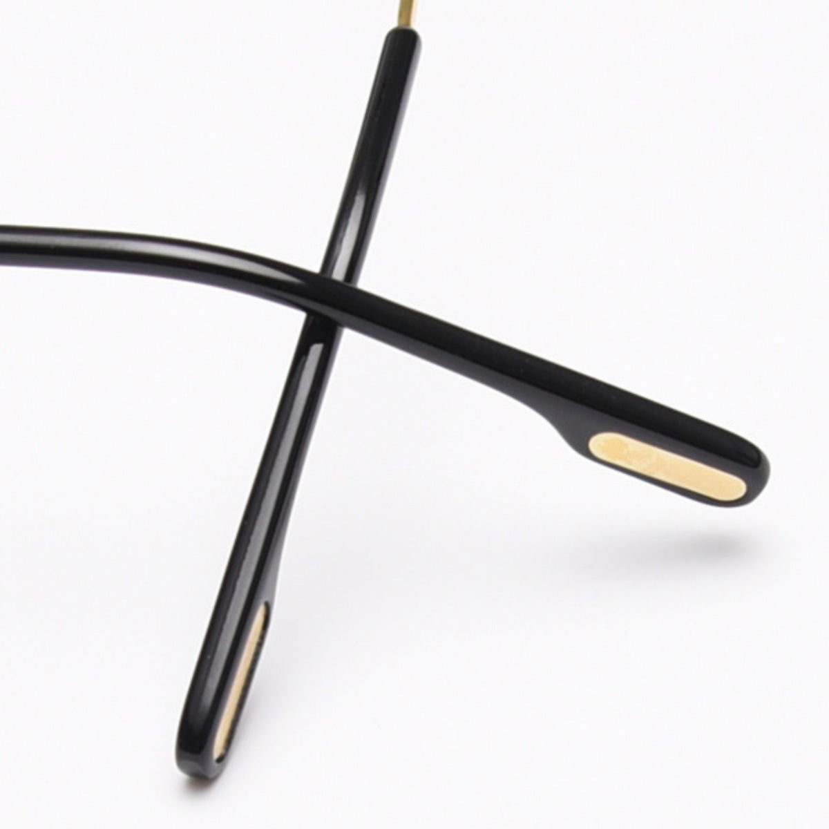 Ilussa Rimless Oval Sunglasses in gold