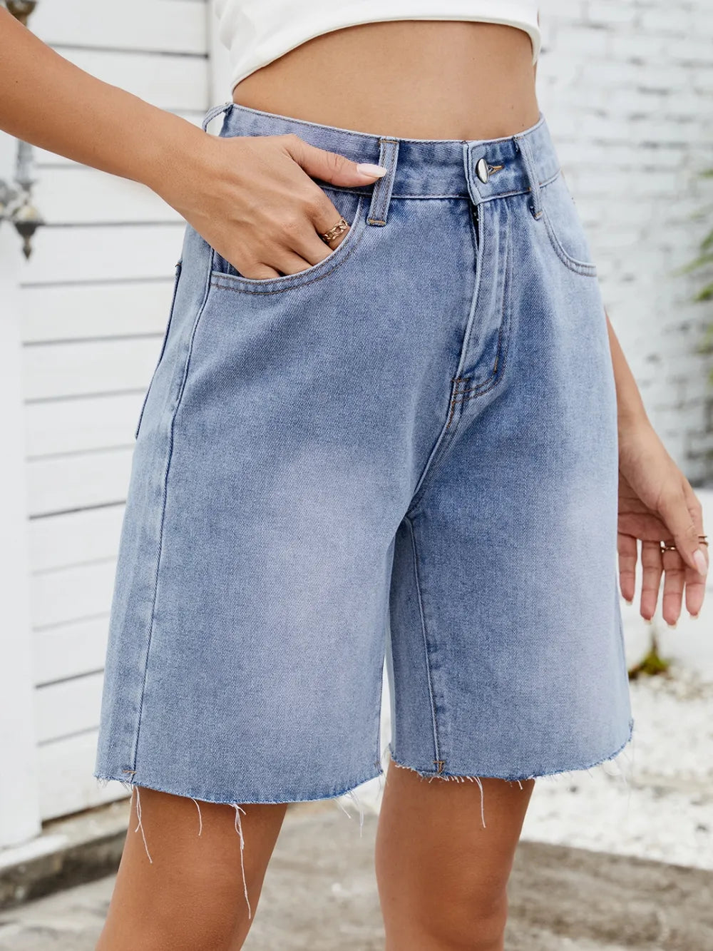 Washed Raw Hem Denim Shorts by Moni Wear