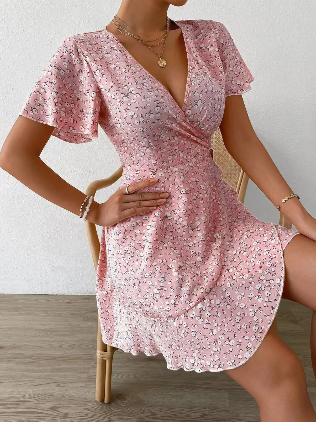 Floral Flutter Sleeve Wrap Mini Dress by Elaine