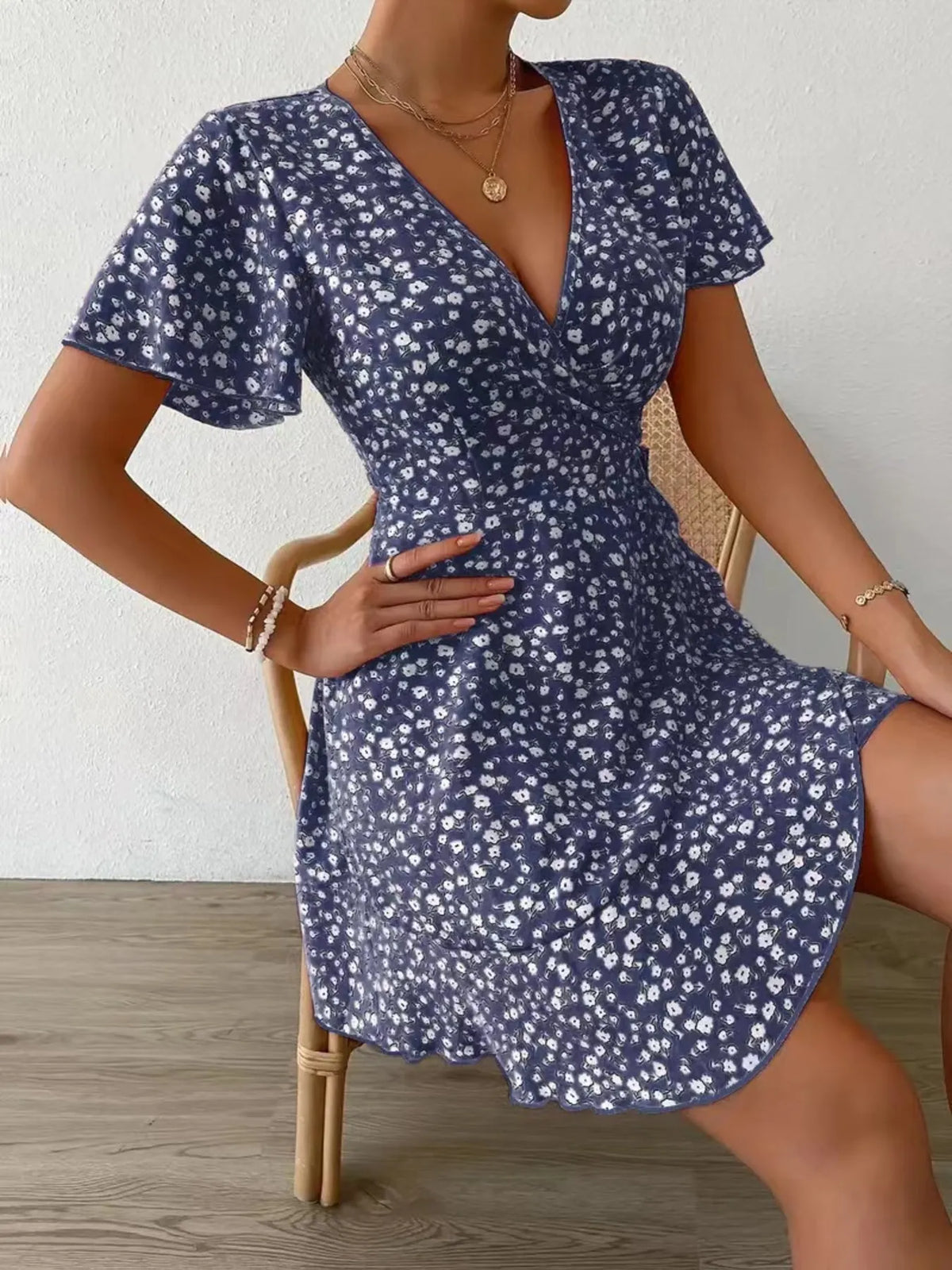Floral Flutter Sleeve Wrap Mini Dress by Elaine