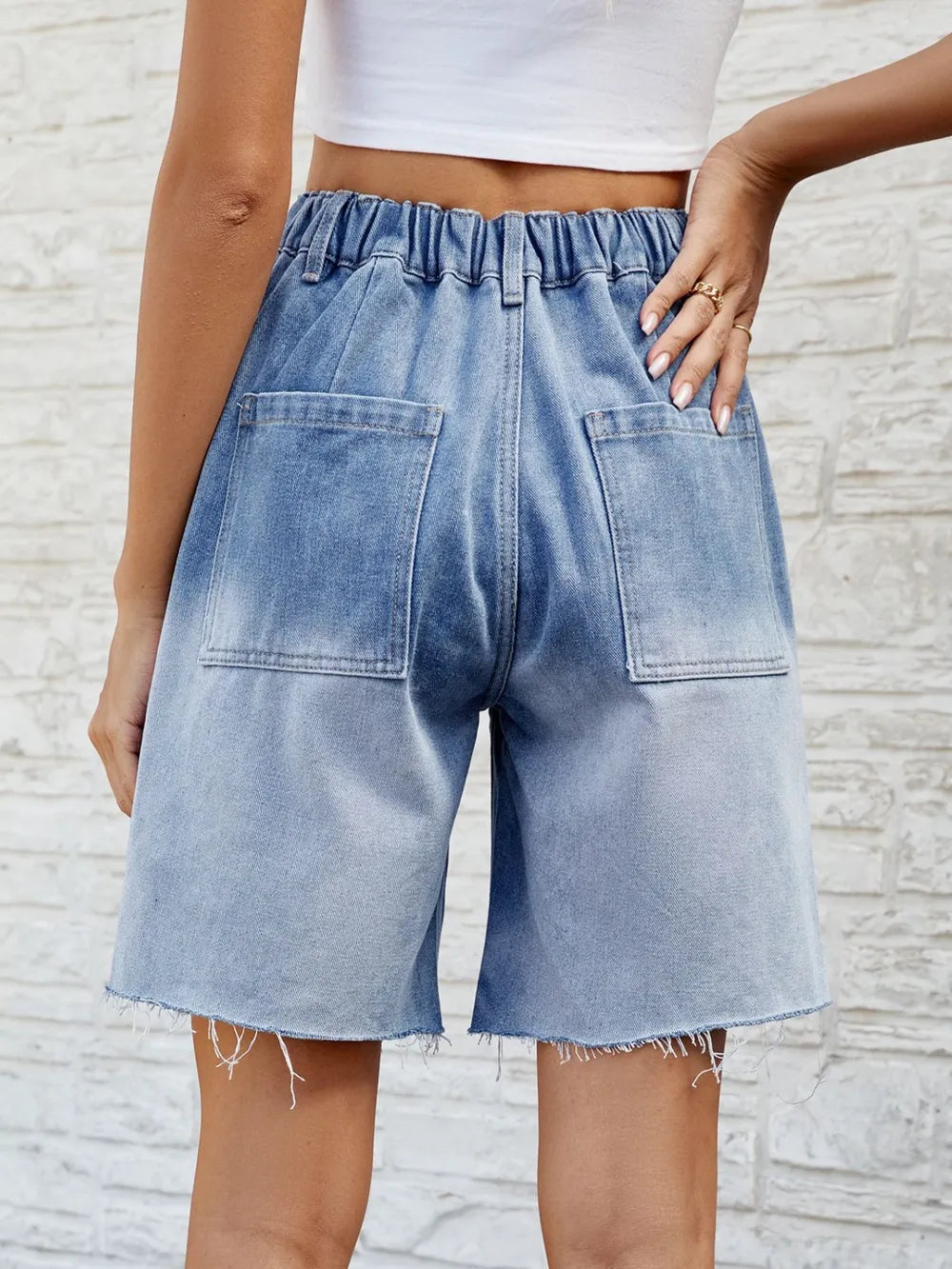 Raw Hem Denim Shorts in Light Blue by Manny