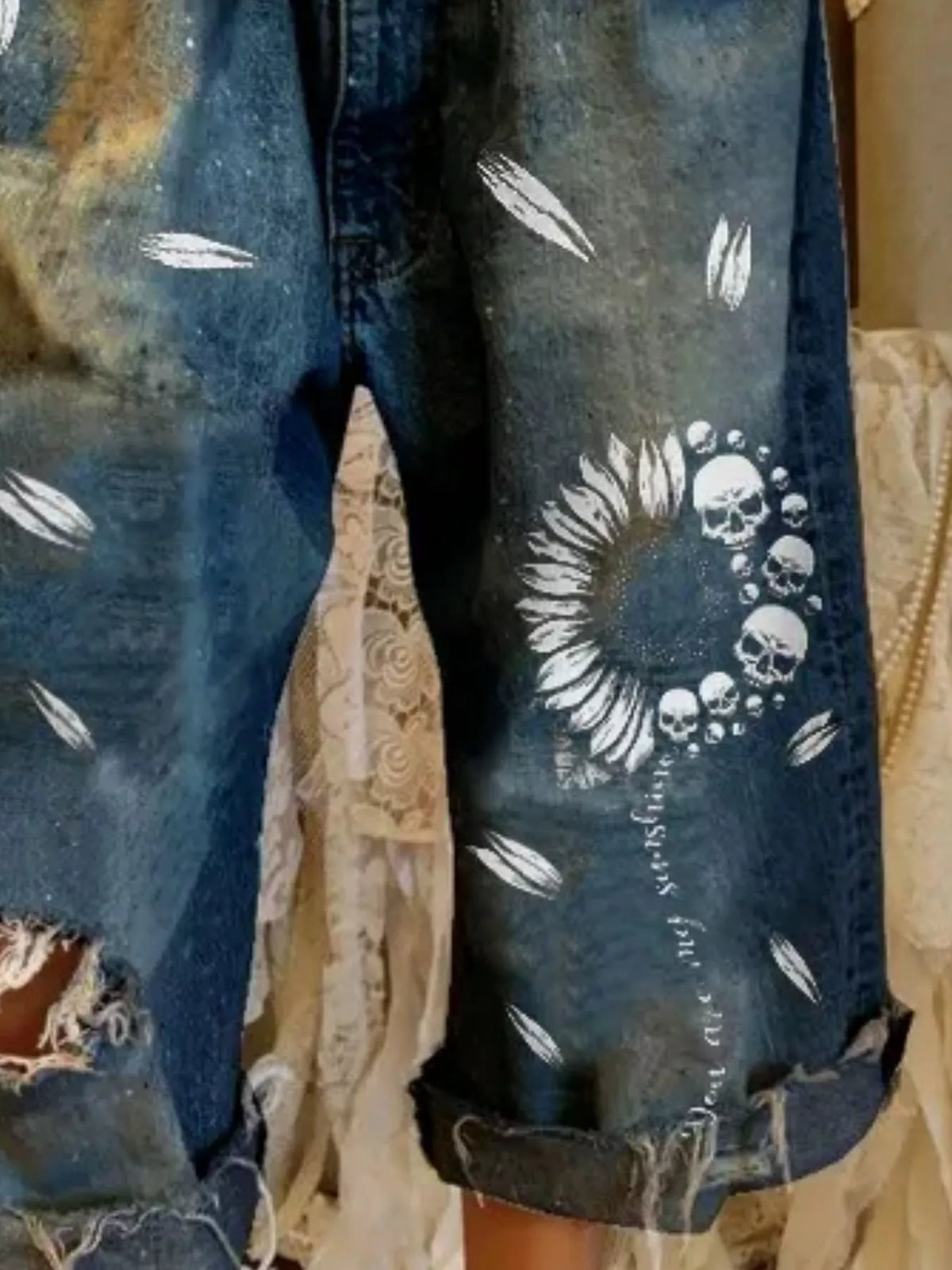 Distressed Skull Print Raw Hem Jeans