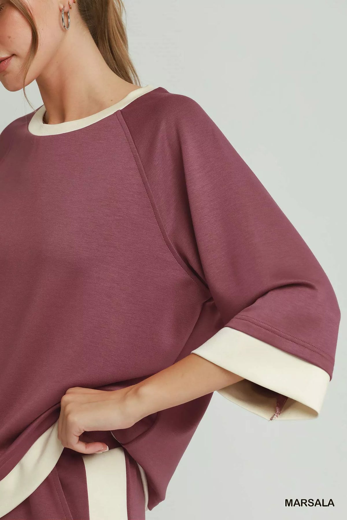 Umgee Colorblock Crewneck Raglan Sleeve Top in Marsala