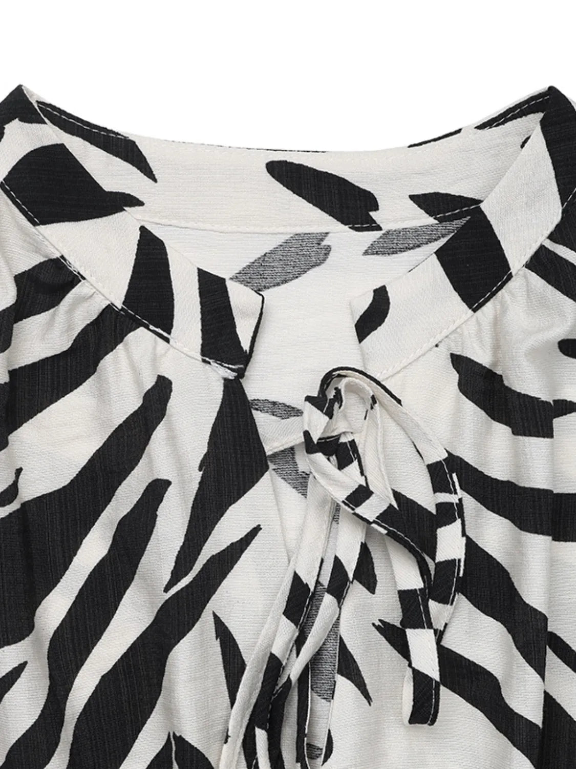Printed Notched Sleeveless Midi Dress in Black