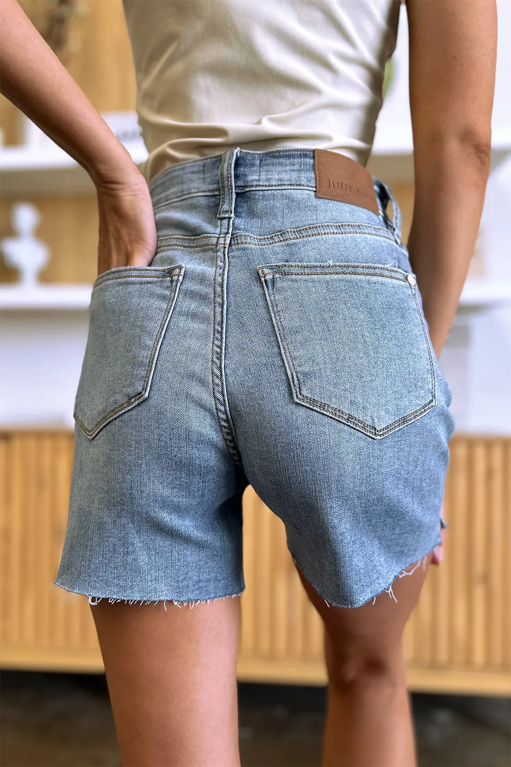 Judy Blue High Waist Raw Hem Shorts in Medium Wash