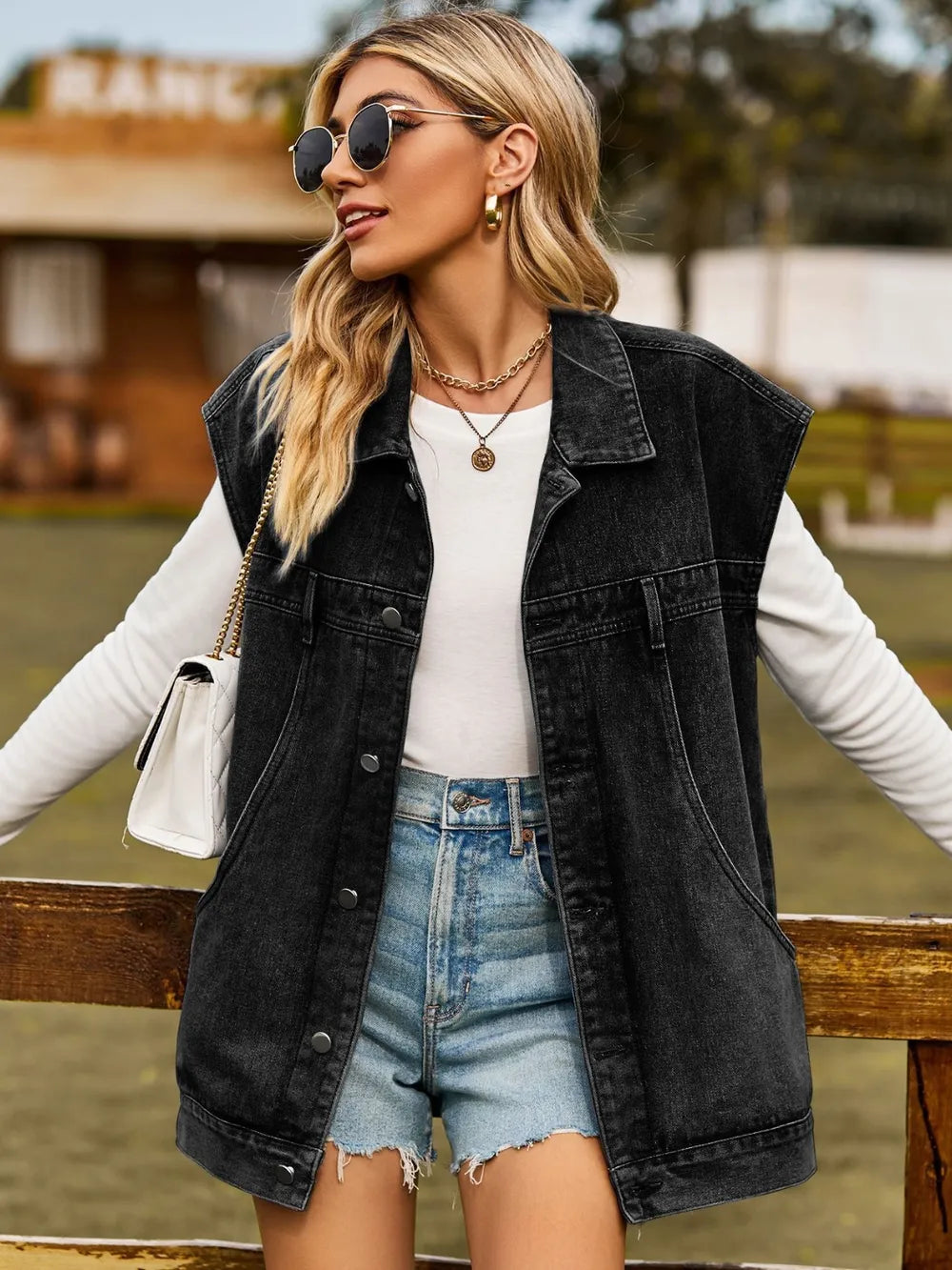 Collared Sleeveless Denim Jacket with Button-Up Front by Manny