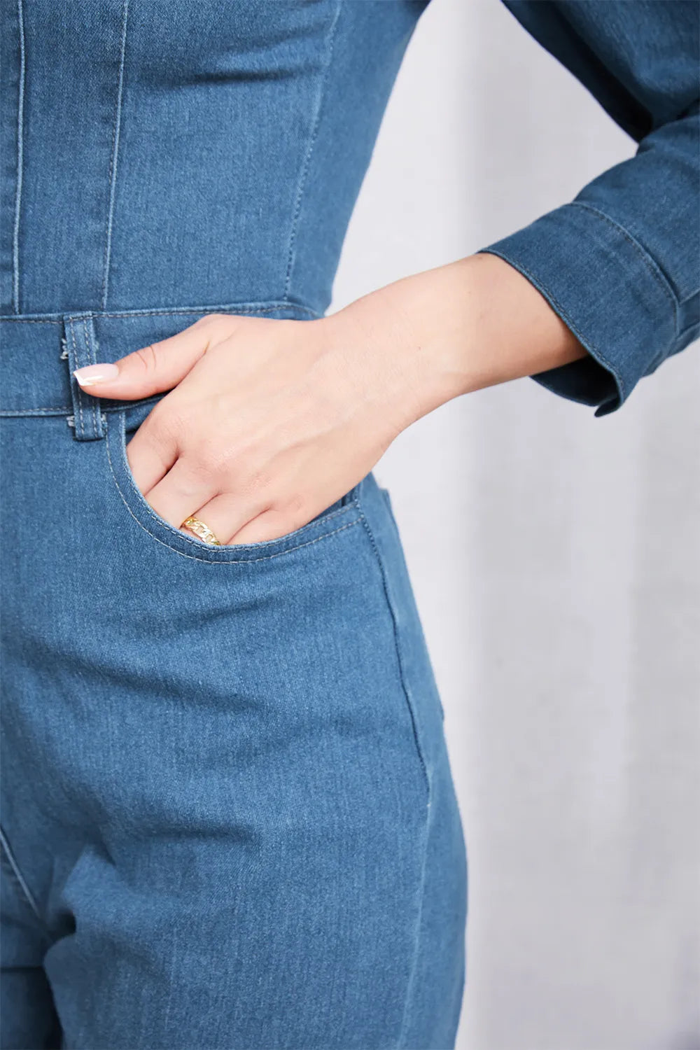 Snap-Down Denim Jumpsuit in Medium Wash by DE.C.H & K.M