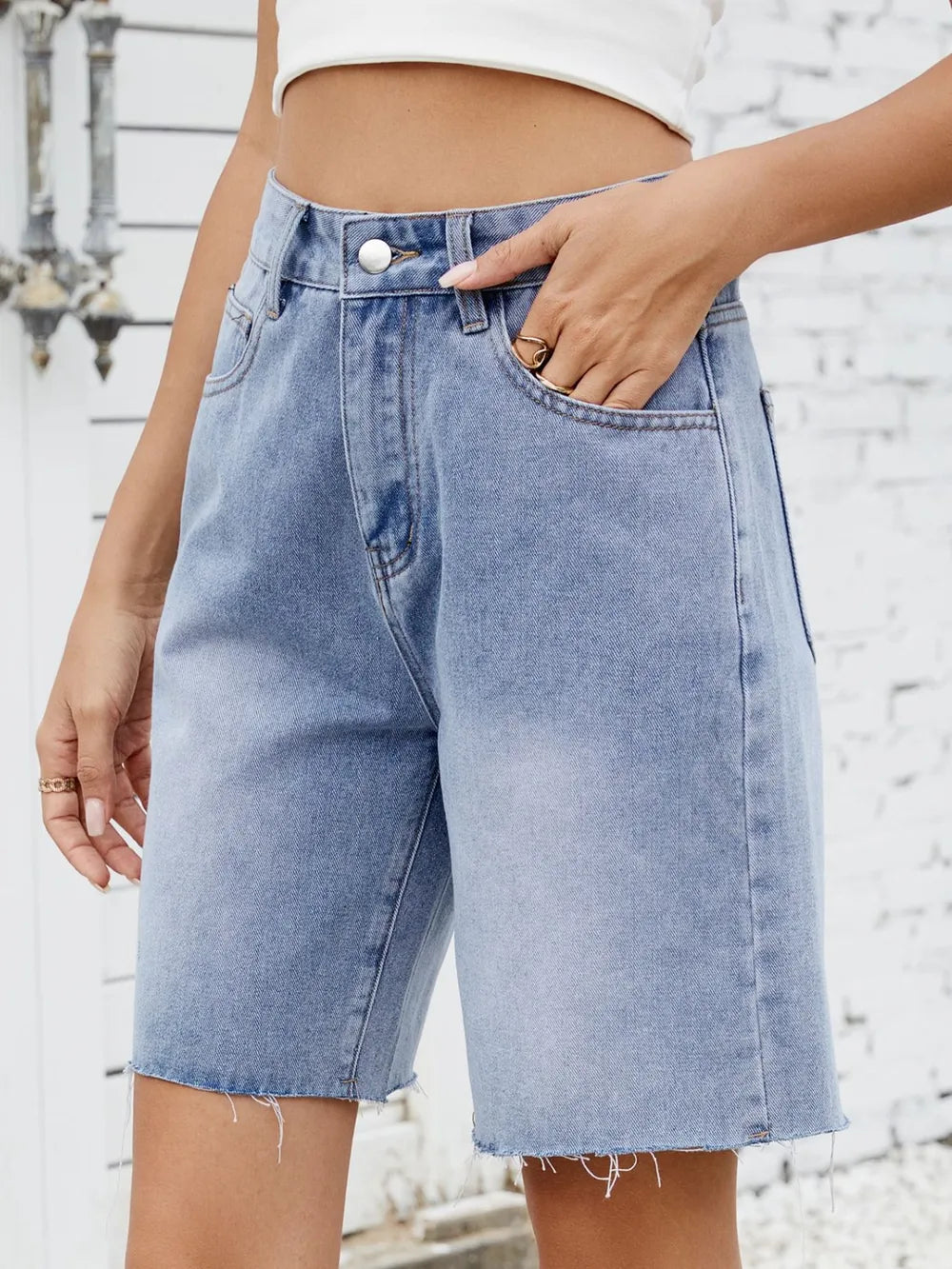 Washed Raw Hem Denim Shorts by Moni Wear