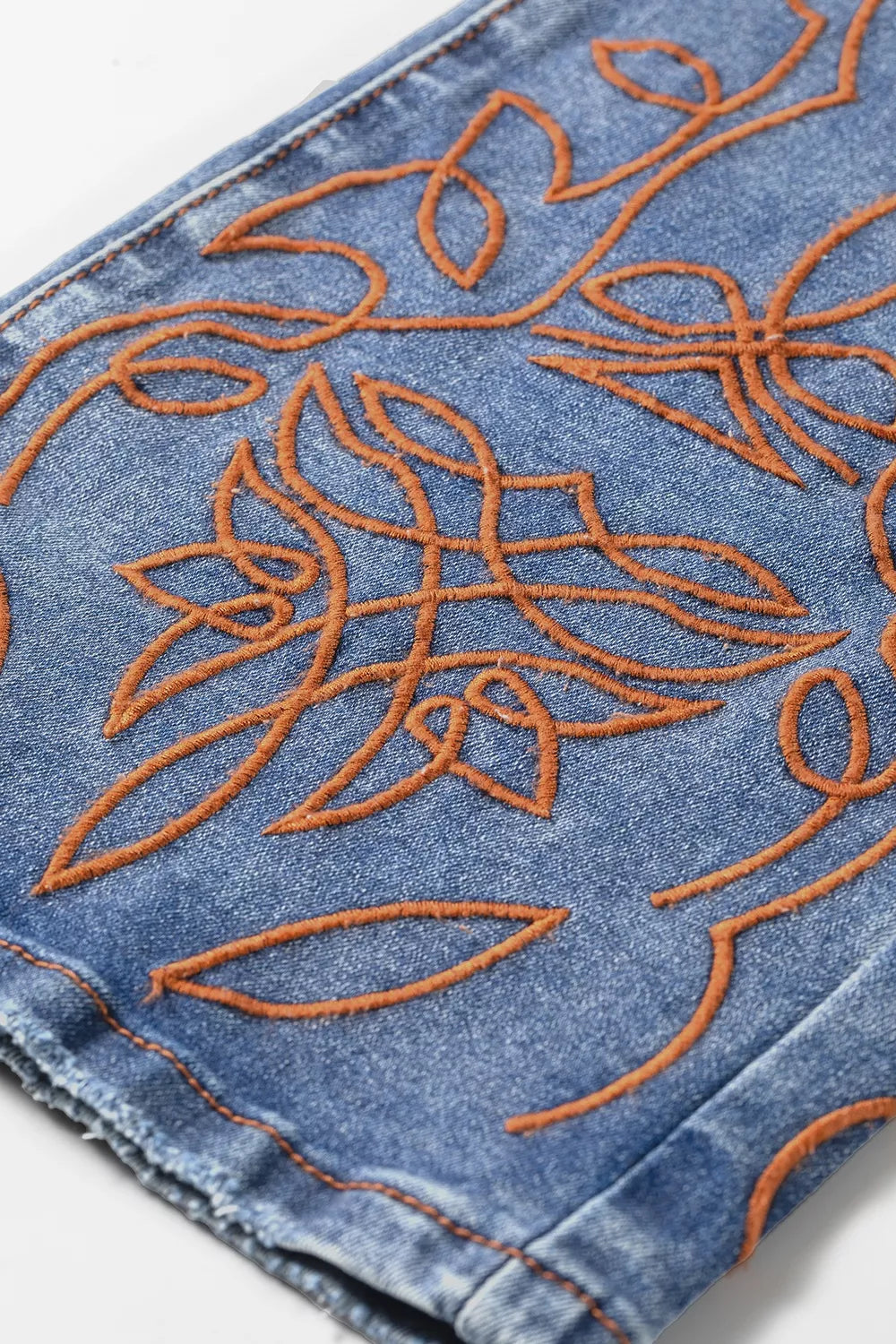 Embroidered Flare Leg Jeans in Medium Wash