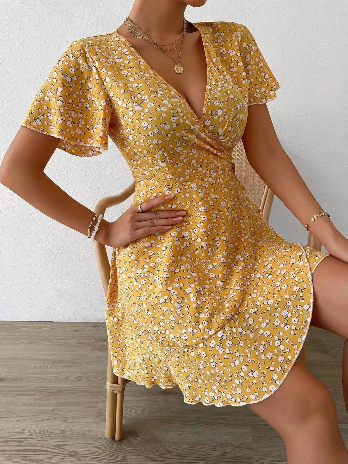 Floral Flutter Sleeve Wrap Mini Dress by Elaine
