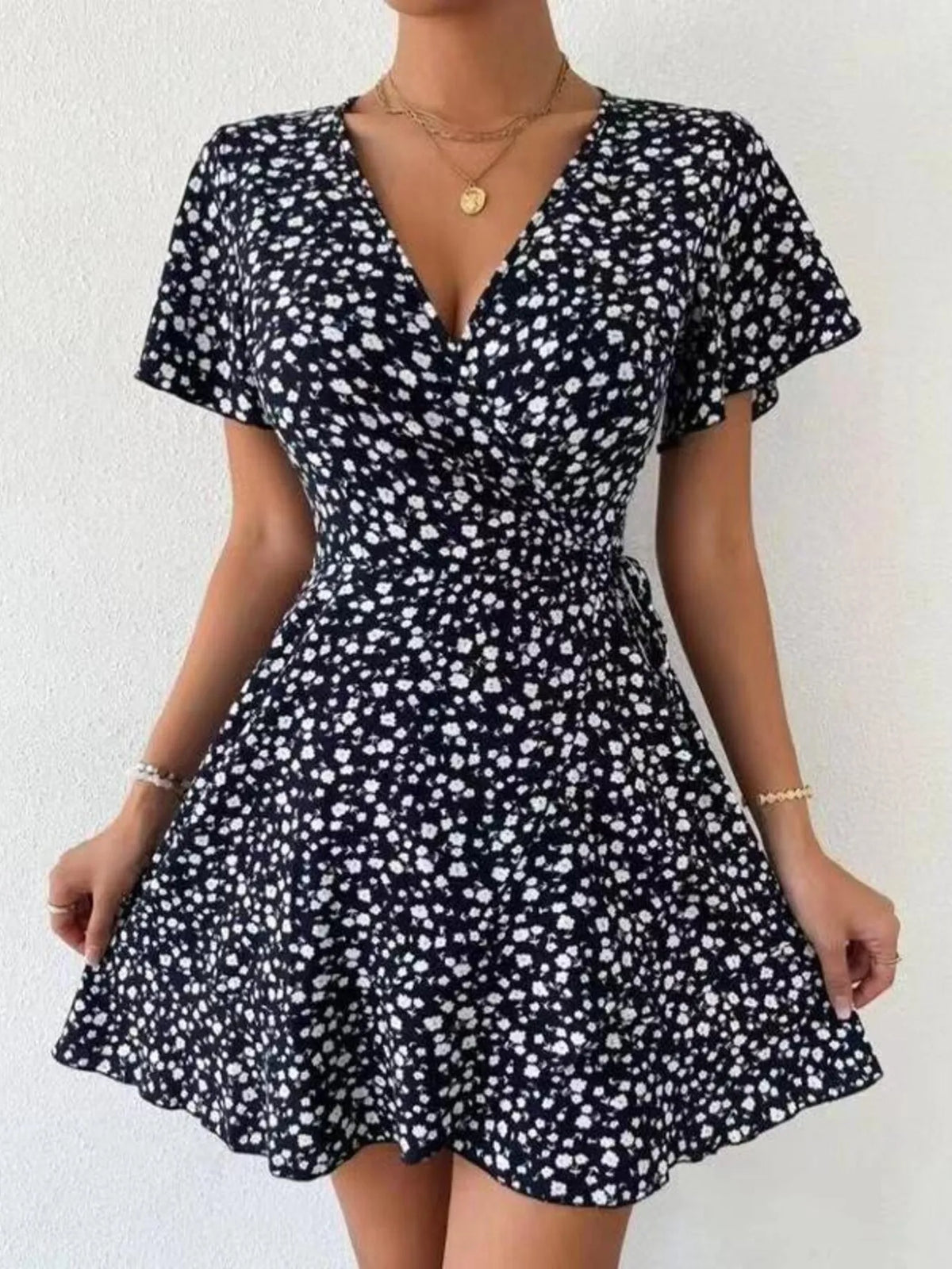 Floral Flutter Sleeve Wrap Mini Dress by Elaine