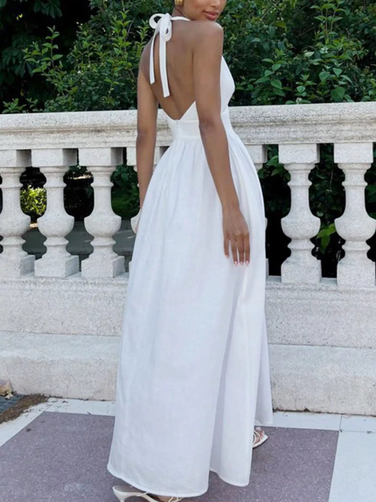 Halter Neck Flowy Maxi Dress in White by Calliope
