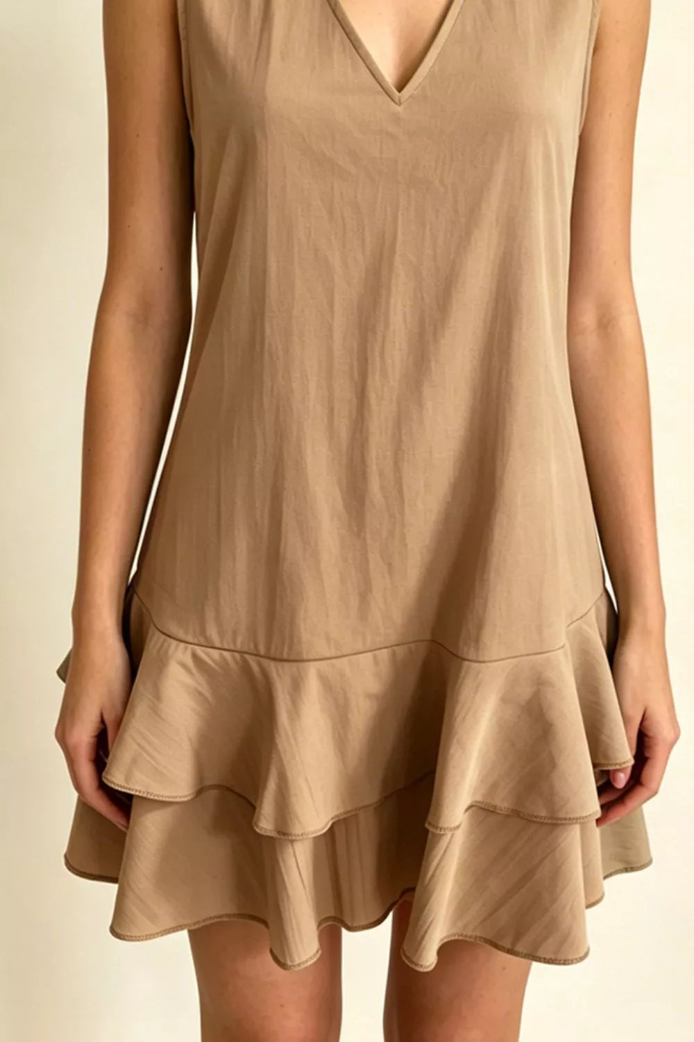 Sleeveless V-Neck Ruffle Hem Mini Dress in Beige