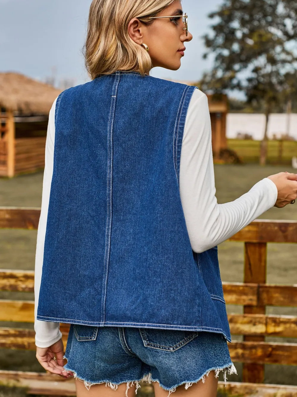 Sleeveless Denim Jacket in Dark Blue by Manny