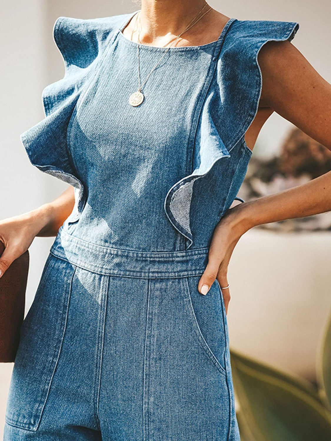 Ruffled Sleeveless Denim Jumpsuit in Medium Wash by Yolan House