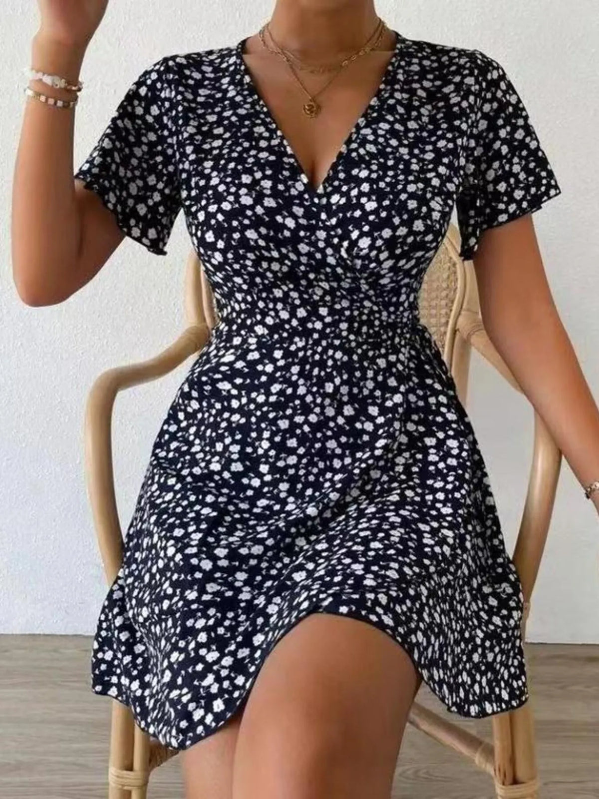 Floral Flutter Sleeve Wrap Mini Dress by Elaine