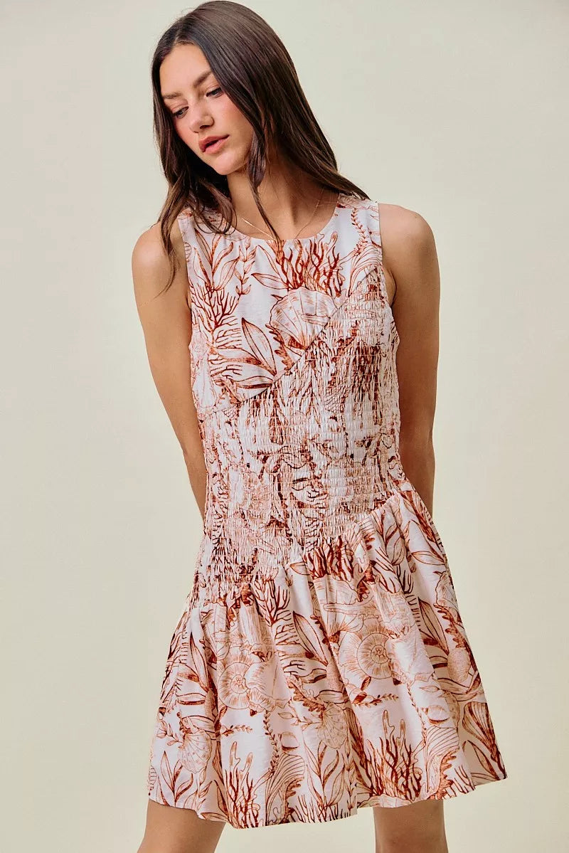 So Me Shell Print Smocked Mini Dress in Taupe