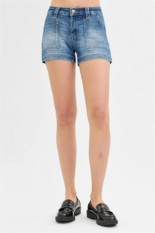 Risen Low Rise Patched Pocket Shorts in Medium Wash